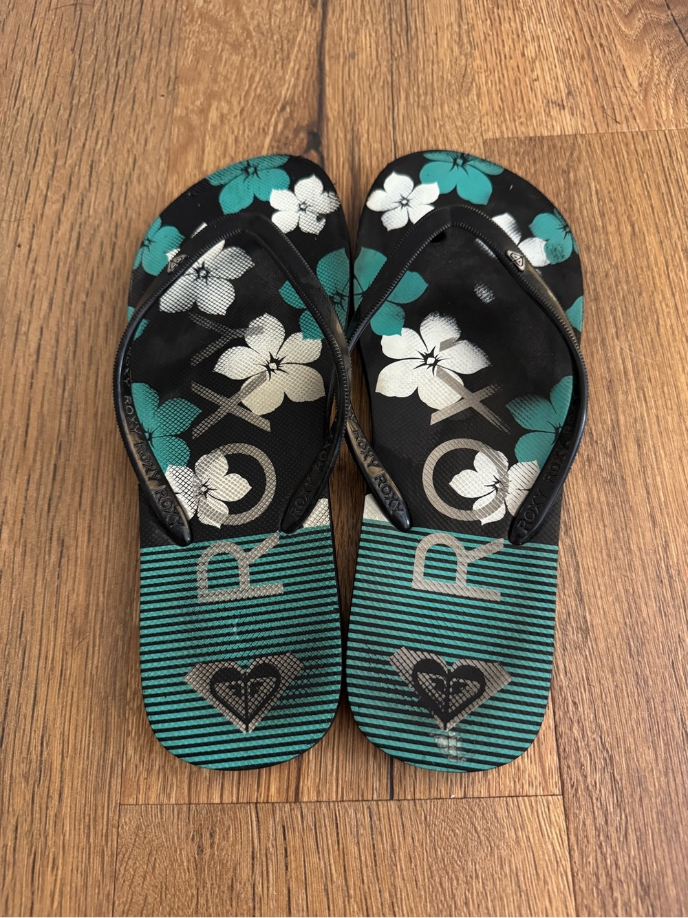 Roxy Black and Teal Floral Stripe Flip Flops